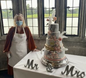 Zdena with one of her cakes at a wedding.