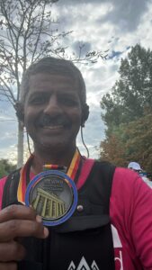 Sambandam selfie holding his medal