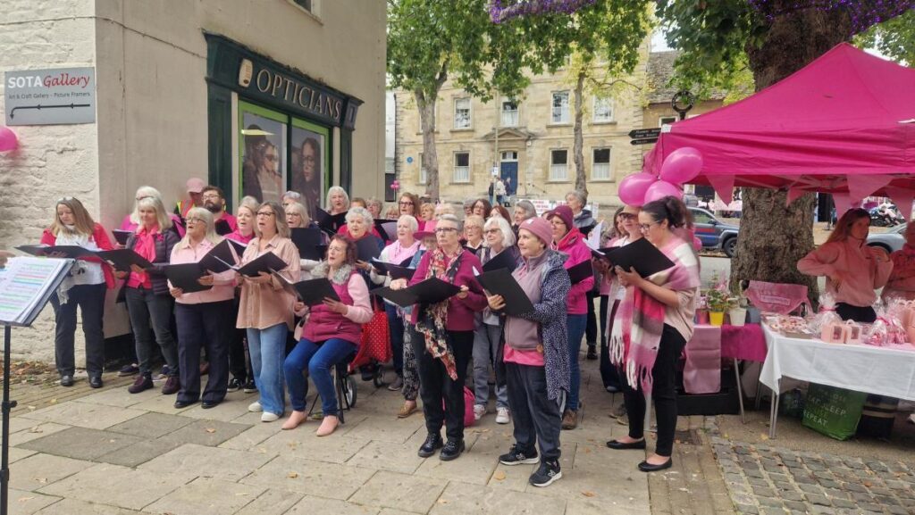 Choir performing at Witney in Pink 25th Anniversary