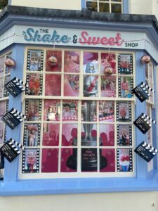 The award-winning Shake & Sweet Shop window display at Witney in Pink
