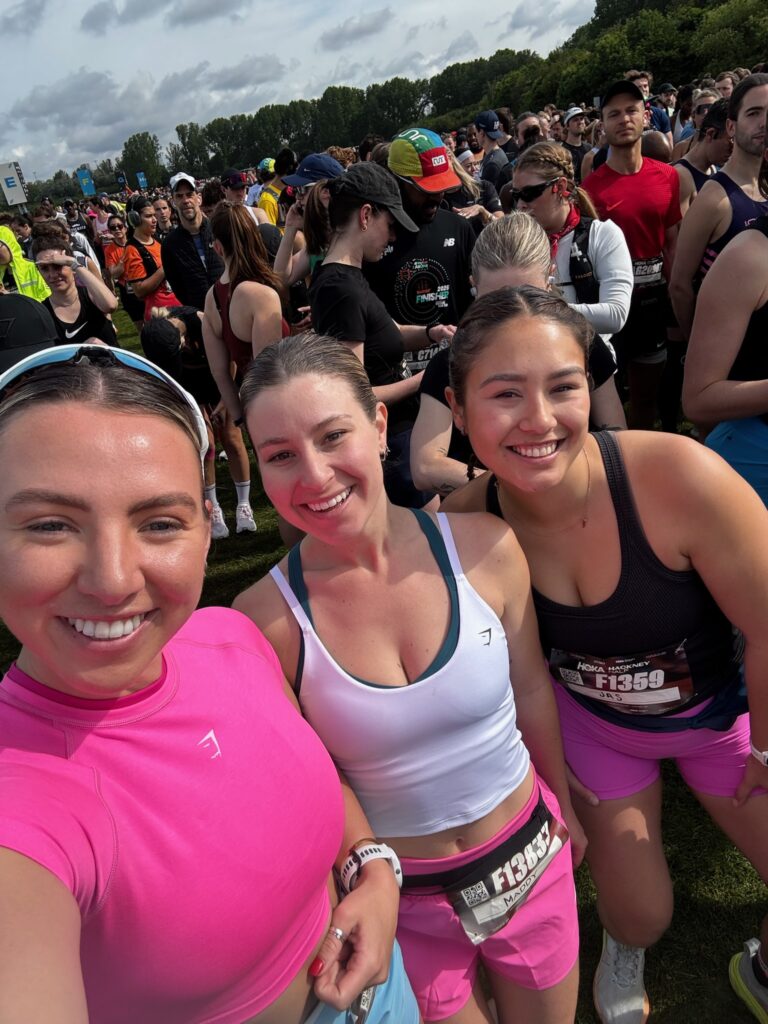 Maddy, centre, with two friends after completing the Hackney Half