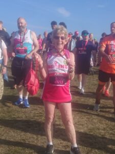 Rose holding her Great North Run medal